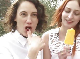 American Babes Explore Each Other's Sexy Bodies Outdoors - Redhead eats icecream and her lesbian girlfriend