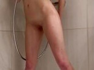Teen undressing and pissing in the shower