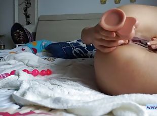Amateur asian teen uses several toys and anal beads!