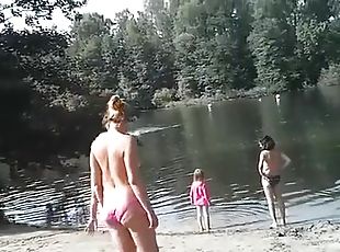 Sunny day at the nudist camp by the river