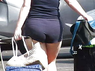 Juicy PAWG in booty shorts with cheeks hangin out