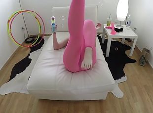 Crazy bitch with glasses rides a really big pink dildo