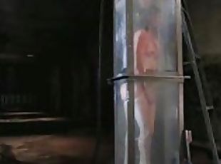 Girl tied up in an ever filling water tank