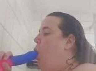 Sucking dildo in shower