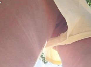 18 year old teen girl in short shorts without panties. Hidden camera in the Park. Close up