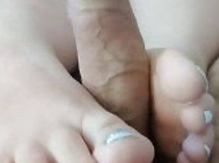 Pretty white toes stroking dick