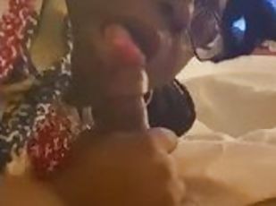 Ebony Milf swirls her tongue around some dick