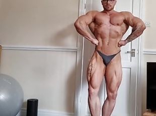 Ripped flexing bodybuilder - muscle worship