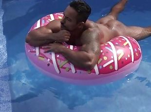 Hot muscle man in pool