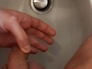 Pissing on my hand with my small dick