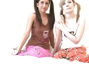 Pigtailed blonde teen goes down on her 18 yr old friend in PJs