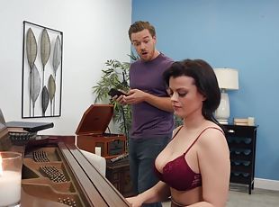 A piano teacher with big soft tits gets her mature pussy drilled