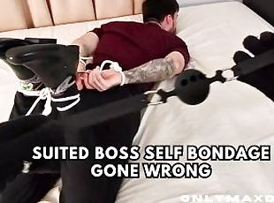 Suited boss self bondage gone wrong