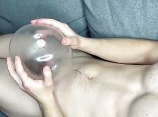 a guy with a big dick fucks a condom and cums with moans