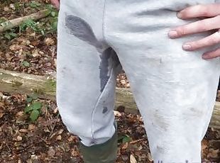 Fully clothed pissing in the woods