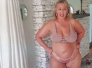 Blonde with big boobs masturbates with a dildo in the bathroom