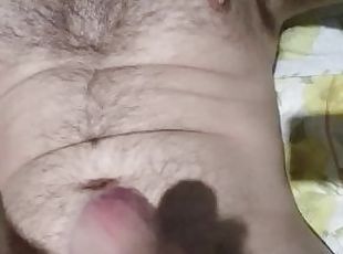 Man with a big, hard cock, masturbates and shows his chest and tongue.