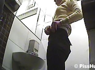 Sensual lady is peeing in the public place with pleasure