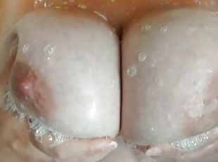 Milf plays with huge tits in shower, soapy, wet fun