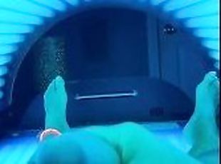 Spanking it in the tanning bed