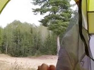 Cumming in Tent Facing Public Dirt Road